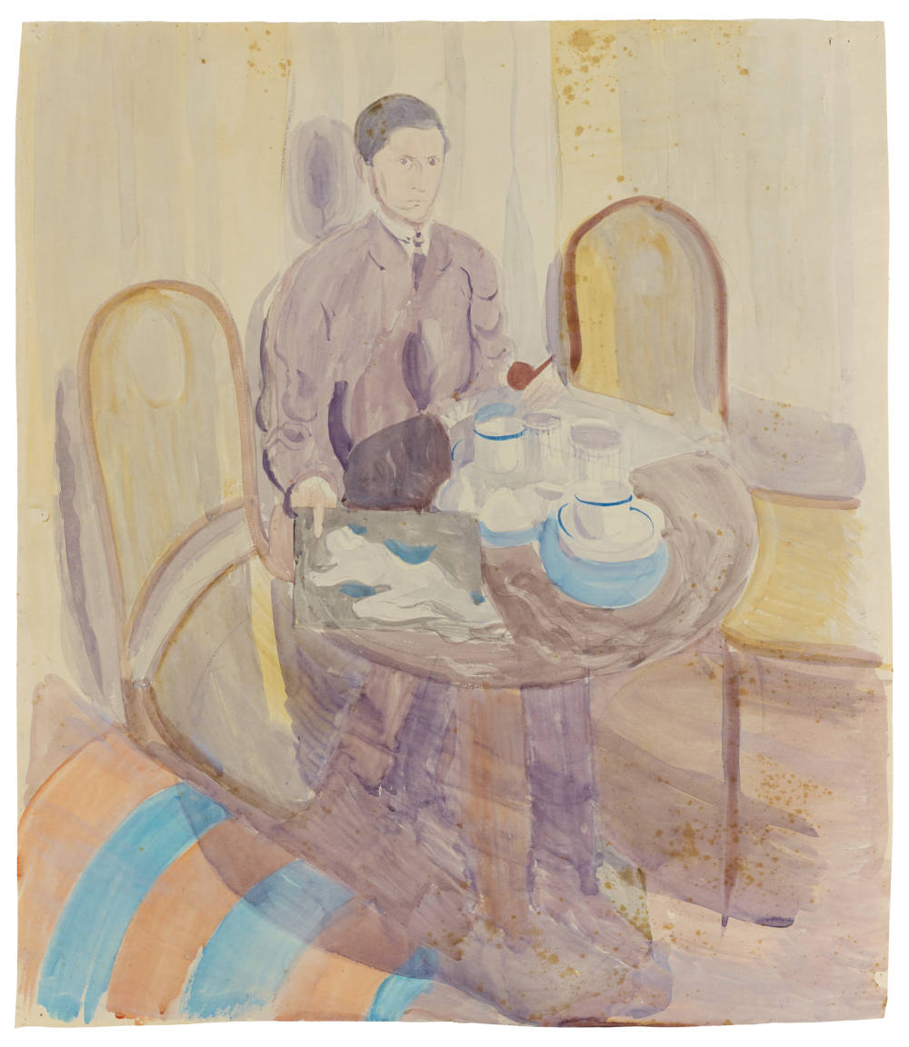 Man at table, holding a pipe and drawing, 1918-1925