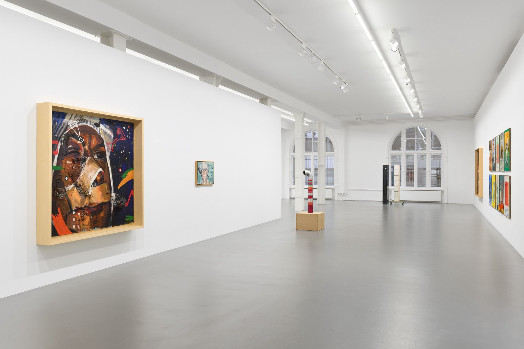 Installation image for Martin Kippenberger: heute denken - morgen fertig. Works from private collections from the 80s and 90s. Photographs by Wilhelm Schürmann and Andrea Stappert, at Galerie Max Hetzler