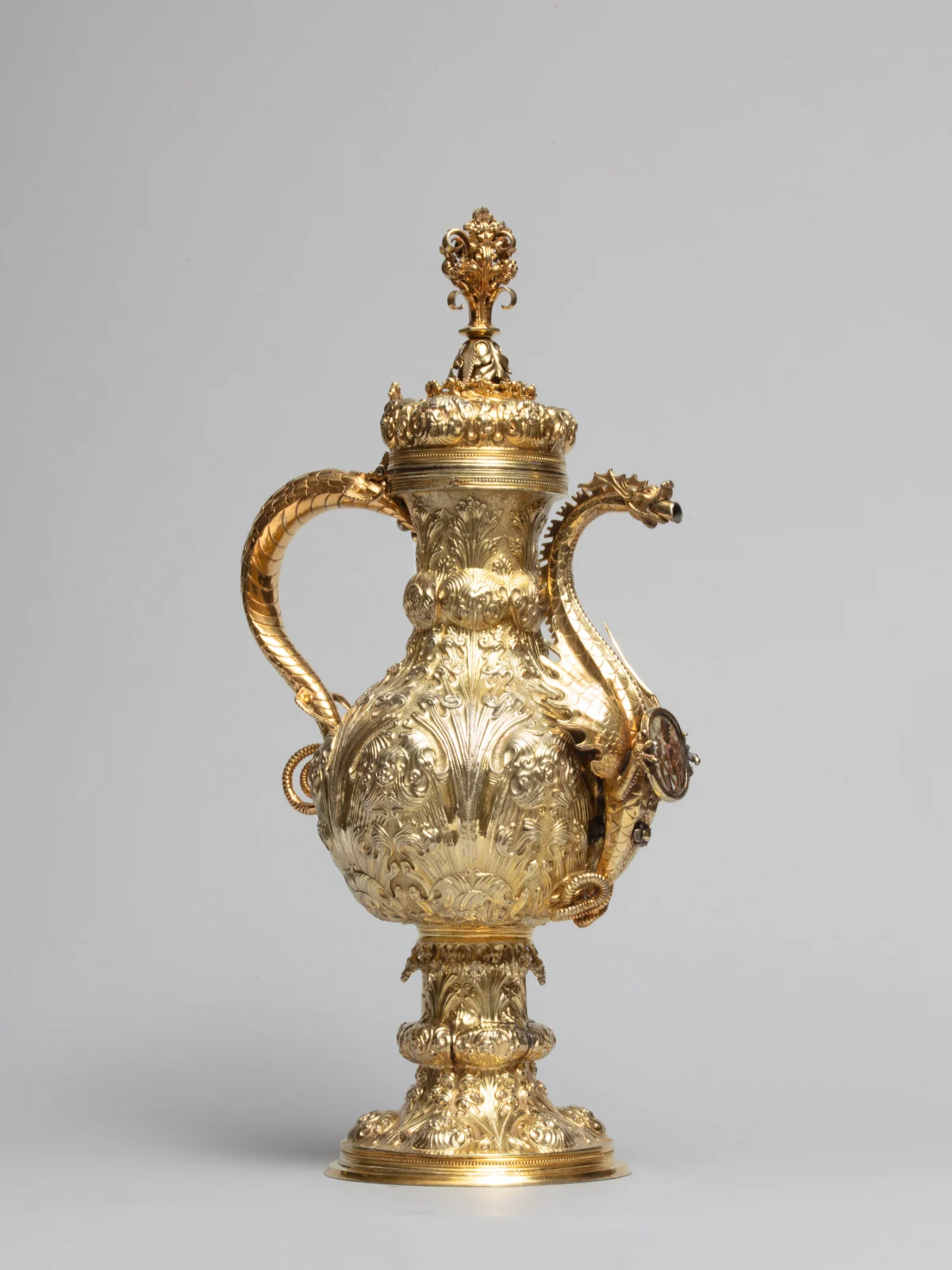 A silver-gilt ewer with dragon-headed spout and repoussé ornament, c. 1500-1520