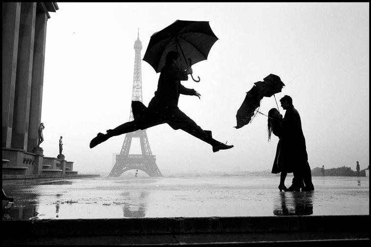Elliott Erwitt, Umbrella Jump, Paris, France, 1989