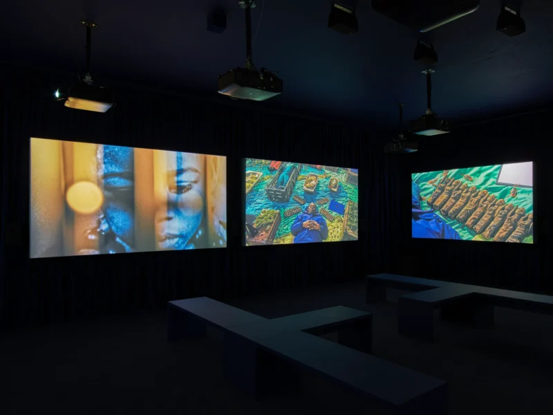 Installation shot from John Akomfrah: Listening All Night To The Rain, @ Lisson Gallery