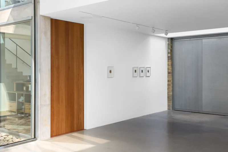 Installation shot from Les Krims: Fictcryptokrimsographs, @ Graces Mews