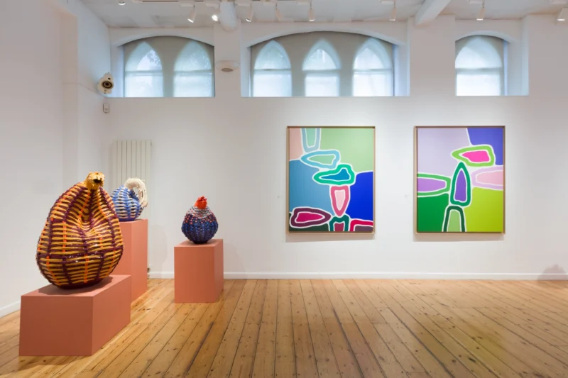 Installation shot from Xanthe Somers & Yacout Hamdouch: Poetic Threads | Spotlight: James Barnor, @ October Gallery