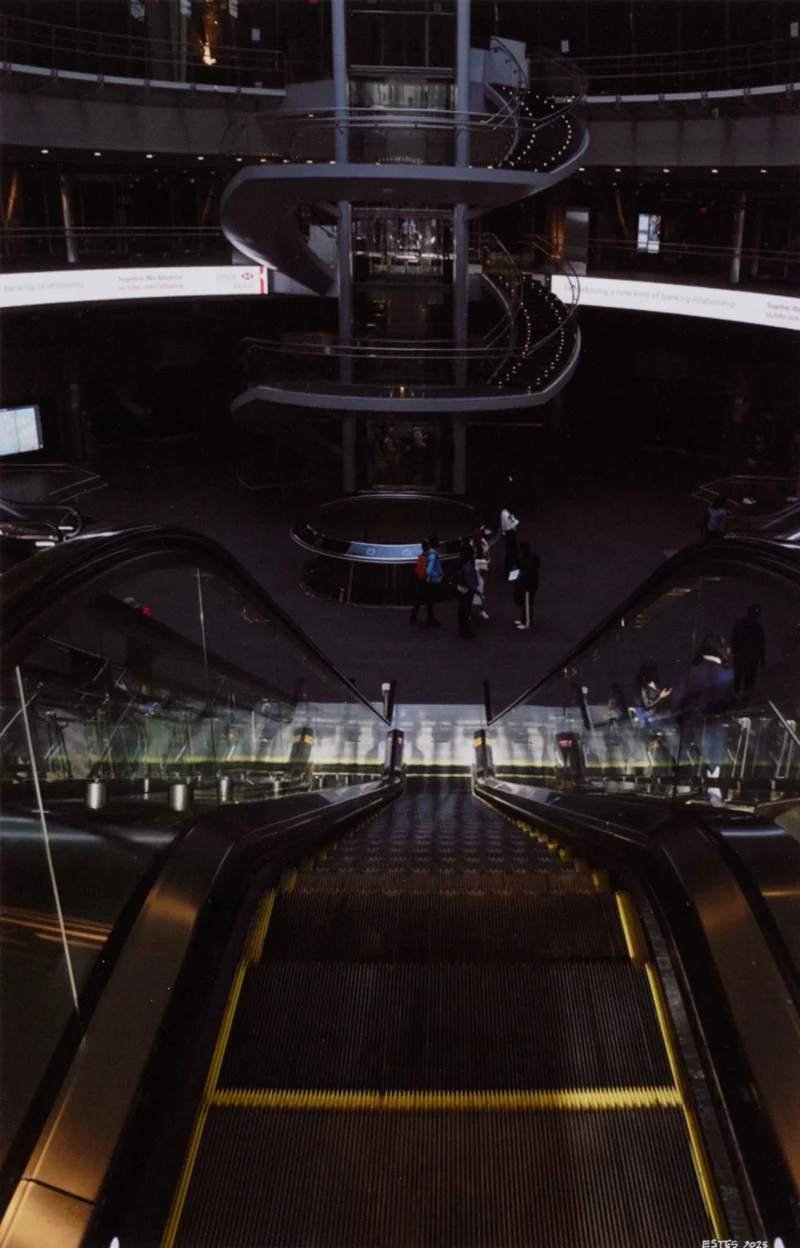 Richard Estes, Escalator at Fulton Center, 2025